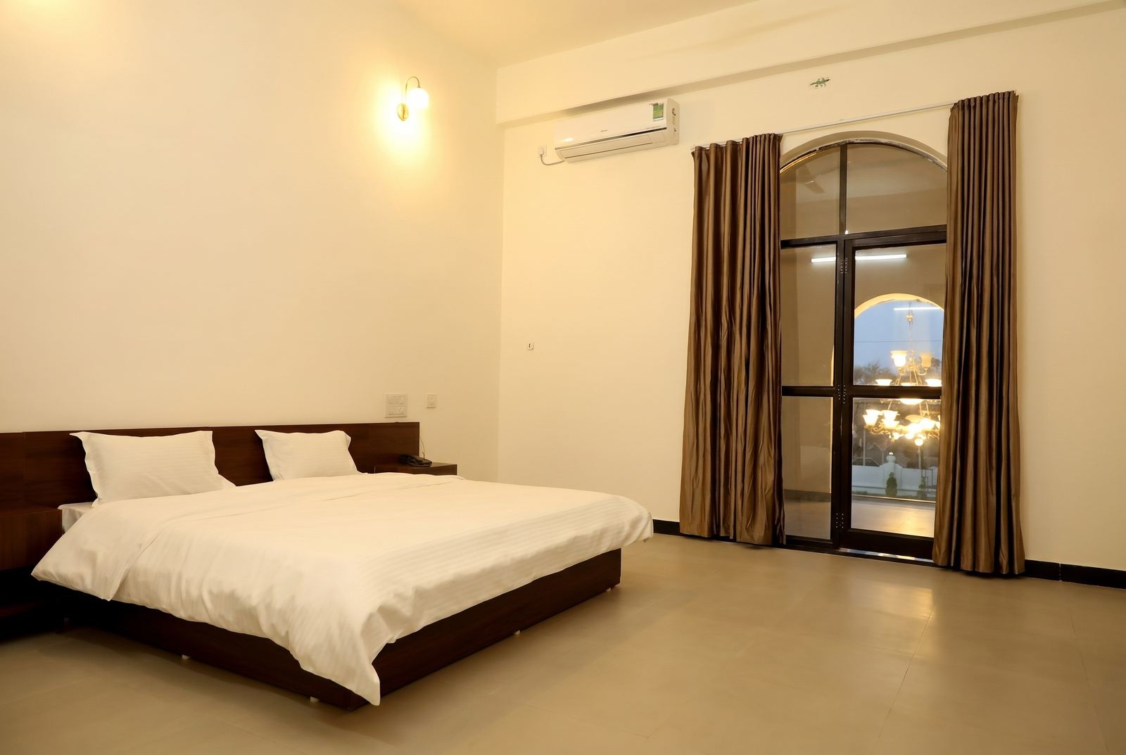 AC room at The Emerald Palace hotel in Sehore